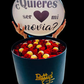 Caja redonda de rosas y chocolates